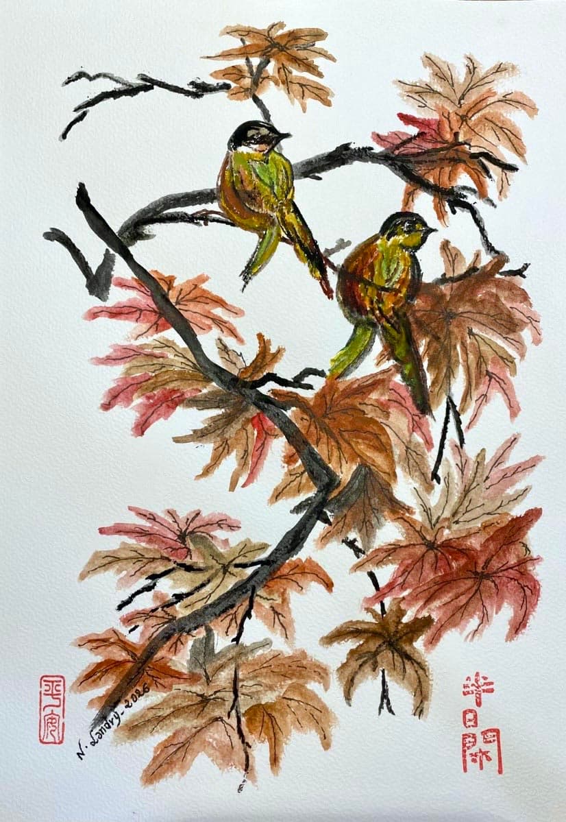 Dos aves sobre un arce otoñal