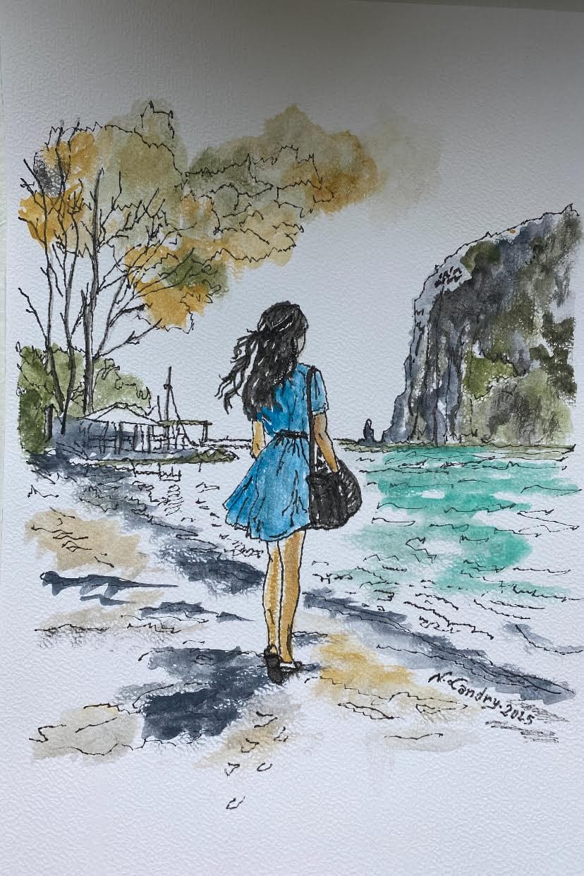 热带海滩上穿蓝色连衣裙的女人